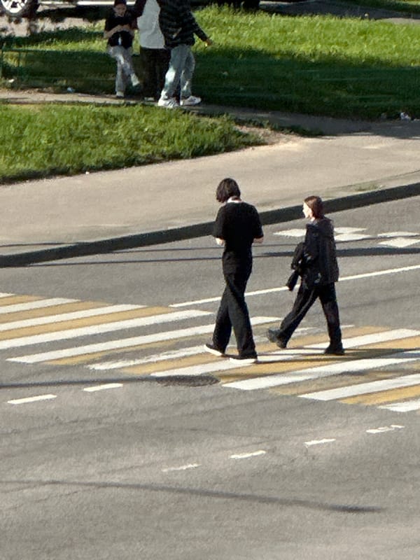 Everyday foot traffic through Podolsk streets on a summer morning