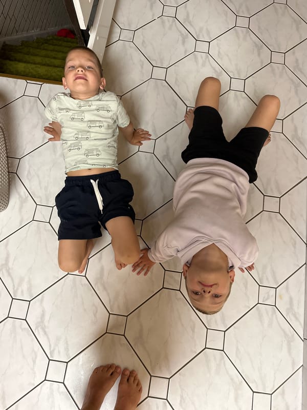 Family yoga and play session documented in Fredenbeck home