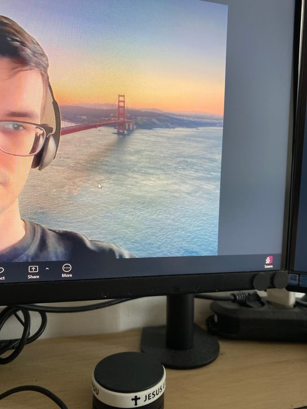 Person works at computer desk with notebook in Subotica