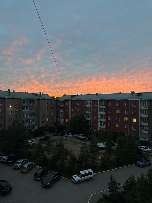 Sunset over a Birobidzhan apartment courtyard