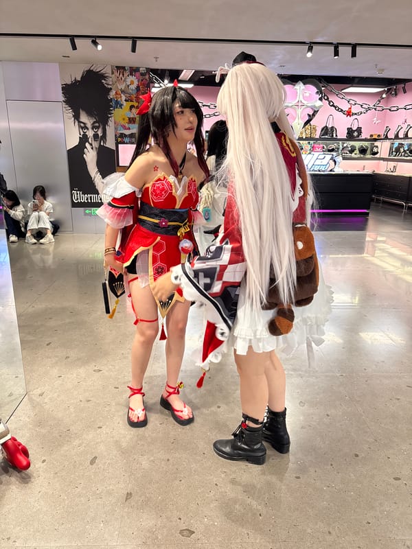Cosplayers gather in early morning urban commercial district