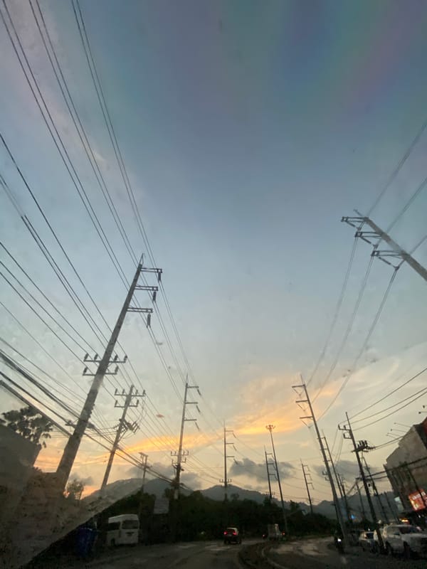 Sunset street scene documented in Kathu, Thailand