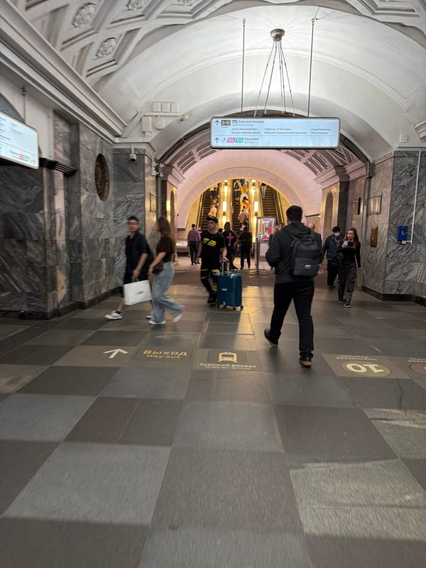 Inside and outside Moscow's metro on a July afternoon