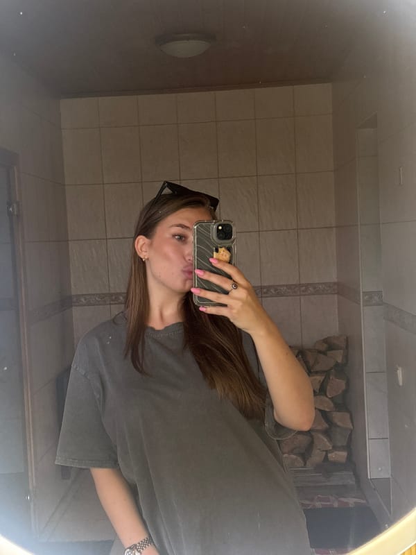 Woman takes bathroom selfies in Pokotylivka, Ukraine