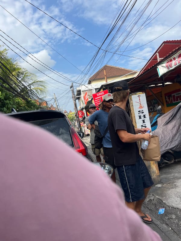 Kuta street life: fruit stalls, narrow lanes, and morning activity