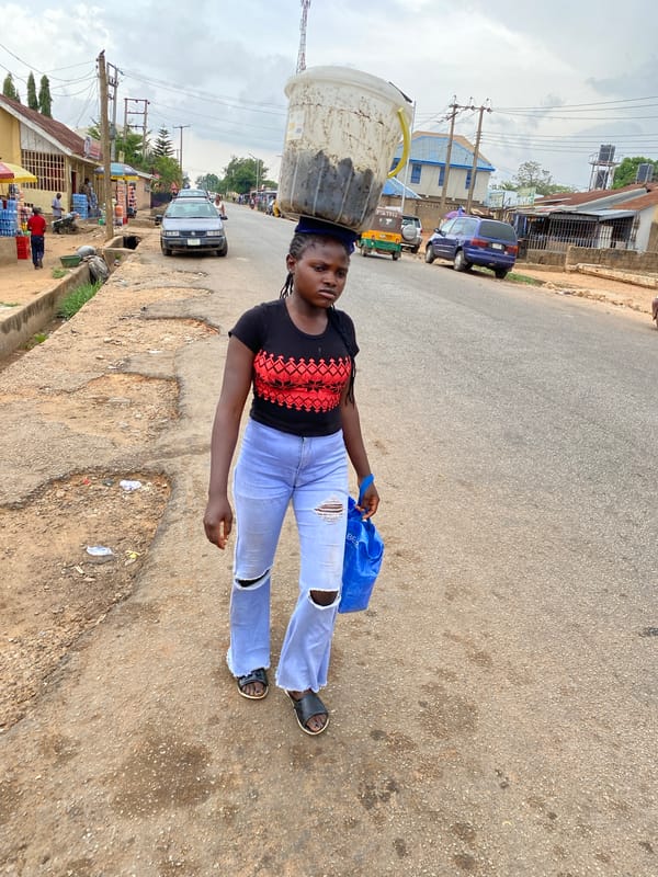 Afternoon street life documented across Bukuru, Nigeria neighborhoods