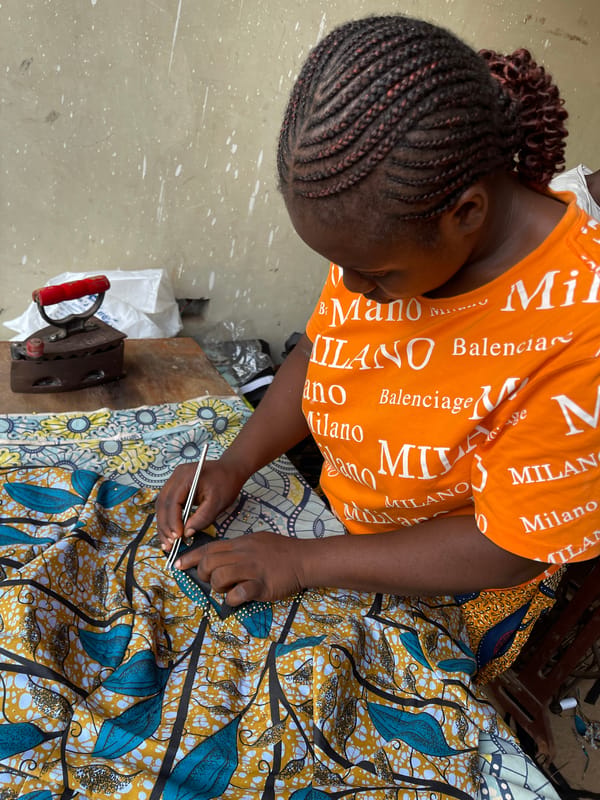 Tailors at work in an Akwanga fabric workshop