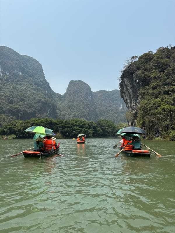 Passenger boats navigate river waters in Vietnam's Hoa Lư Ward