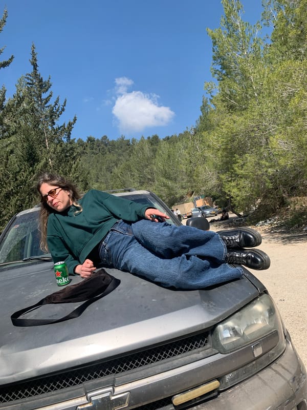 Small group gathers outdoors in Jerusalem on sunny morning