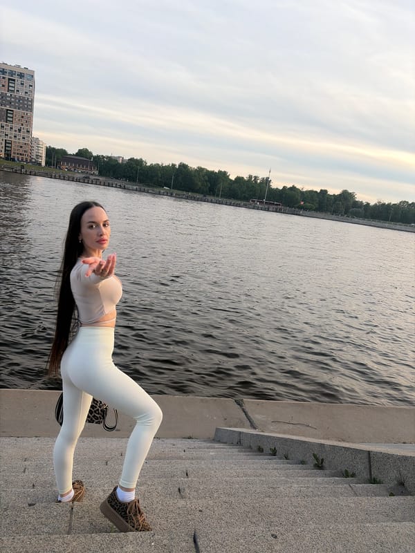 Evening riverfront scenes documented across Russian urban area