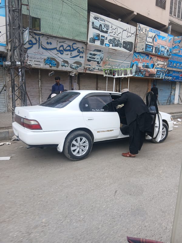 Early morning street activity observed in Quetta commercial area