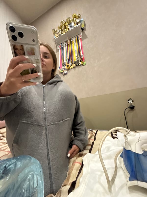 Quick selfie session in a Dnipro bedroom, July 2026