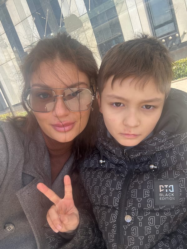 Boy and woman pose for selfie in Krasnogorsk