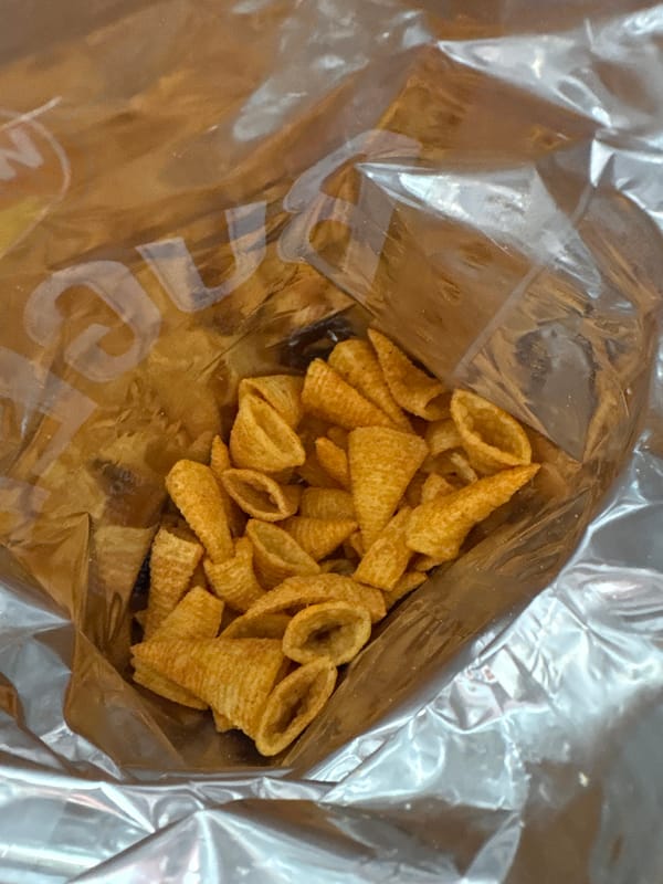 Open corn snack bag documented in Manchester