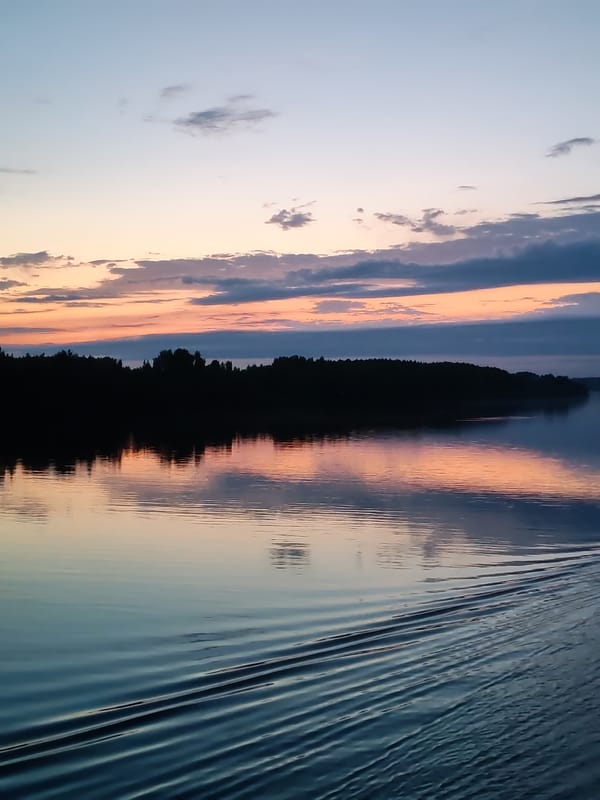 Peaceful water scene observed at dawn or dusk