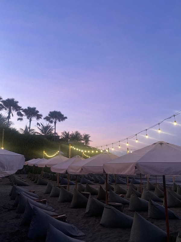 Dusk settles over North Kuta beach under a pastel sky