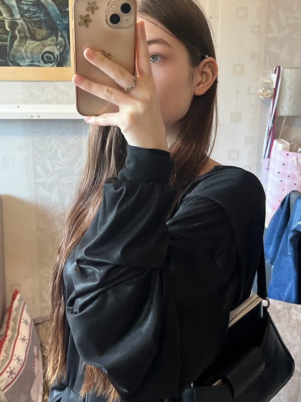 Mirror selfie captured in indoor setting near Vyborg, Russia