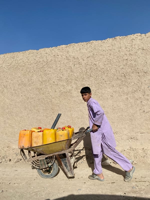 Young man in traditional dress spotted on Mandisar road