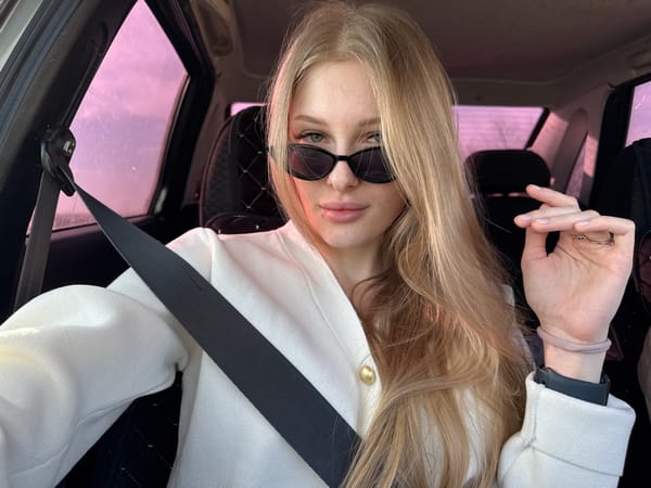 Woman in sunglasses spotted in vehicle passenger seat, Кондратово
