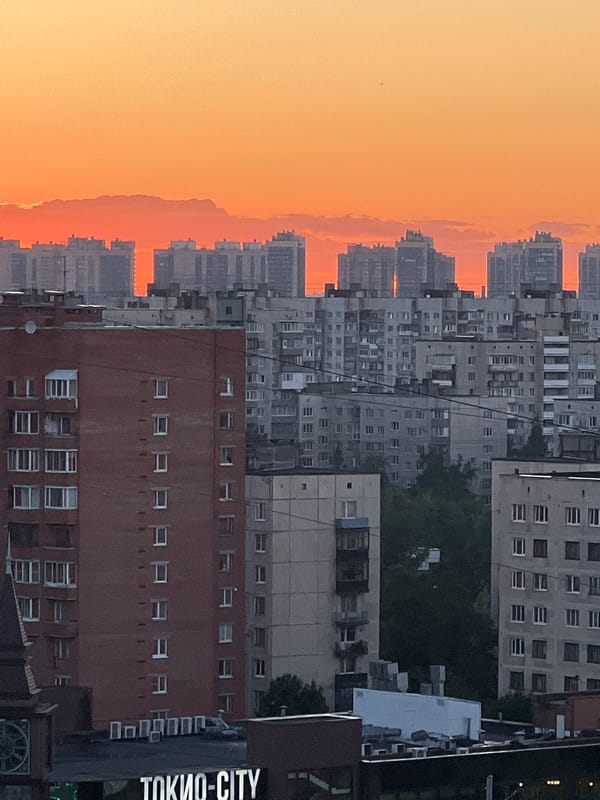 Sunset over Soviet apartment blocks near Ladoga Lake