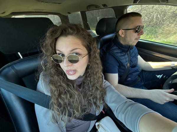 Couple spotted in playful moment while driving in Nikolaevo