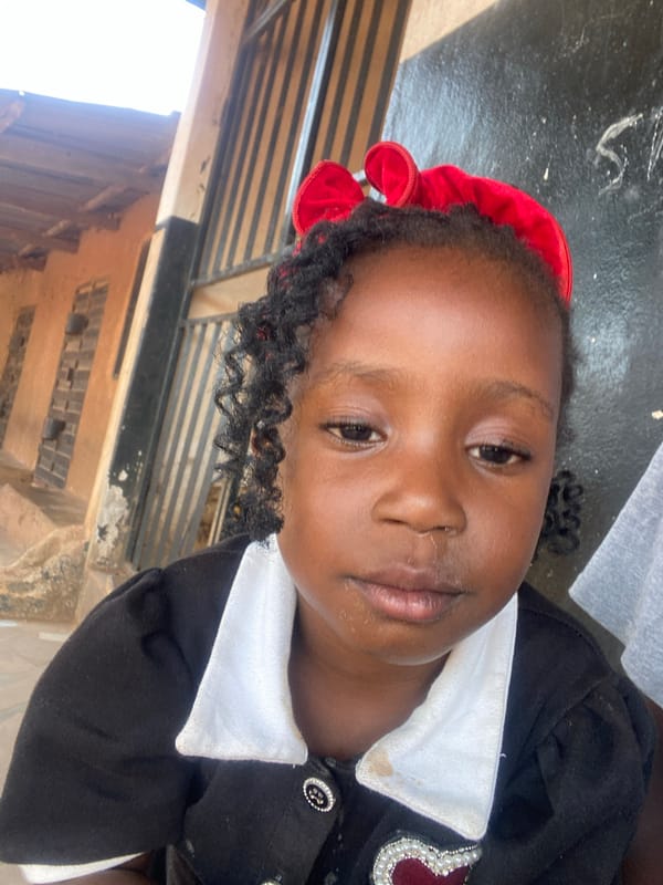 Young girl photographed in multiple poses in Kuru, Nigeria