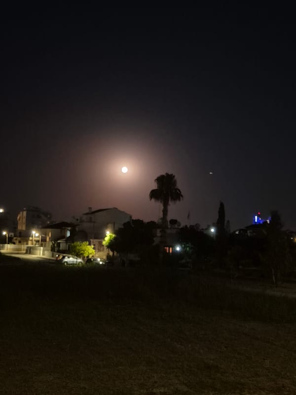 Full moon over Larnaca's salt lake and suburbs