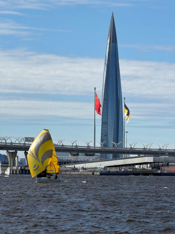 Regatta day on the Neva, with a lively waterfront scene alongside