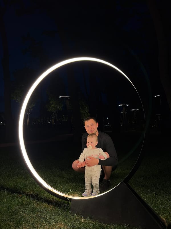 Evening photo session at illuminated park installation in Krasnodar