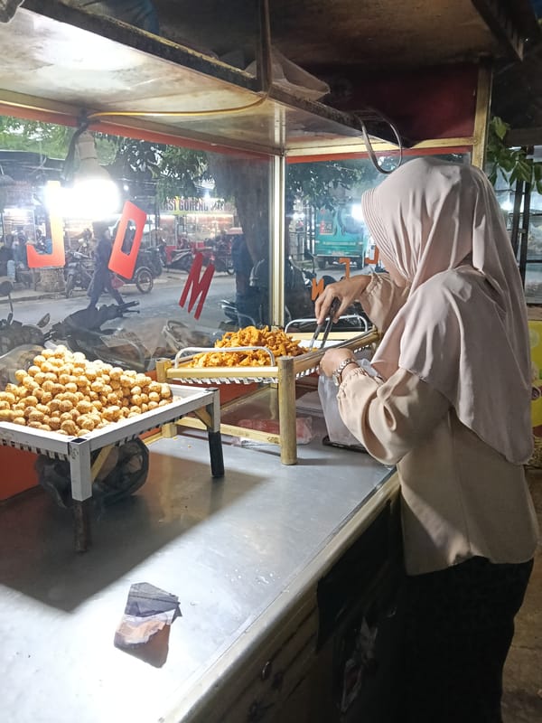 Daily life captured across Lhokseumawe streets and businesses