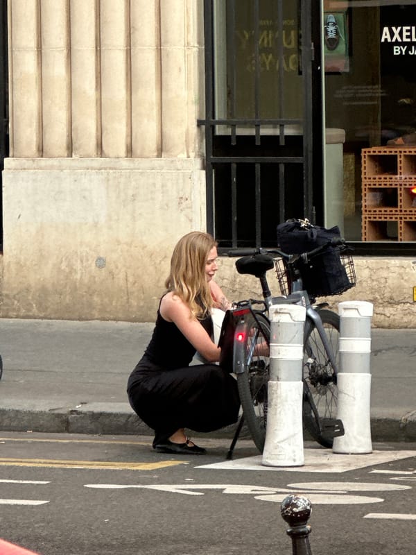 Parisians captured in casual street moments during evening hours