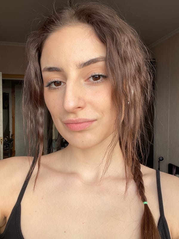 Woman documents beauty routine in Moscow selfie session