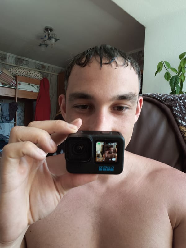 Man takes playful indoor selfies in Berezne home