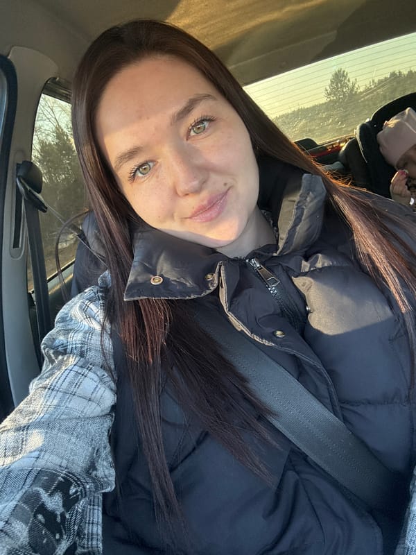 Woman takes car selfie in Гаревая, Russia