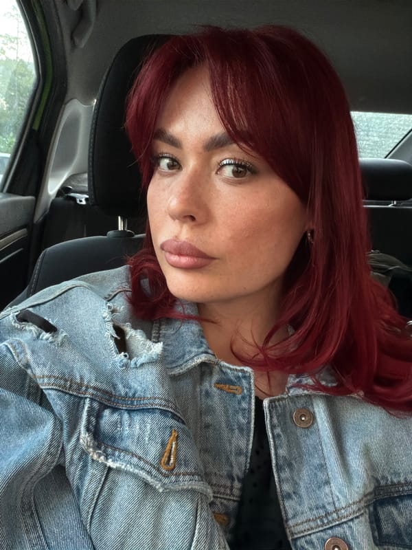 Close-up selfie pair, red hair and denim, Togliatti