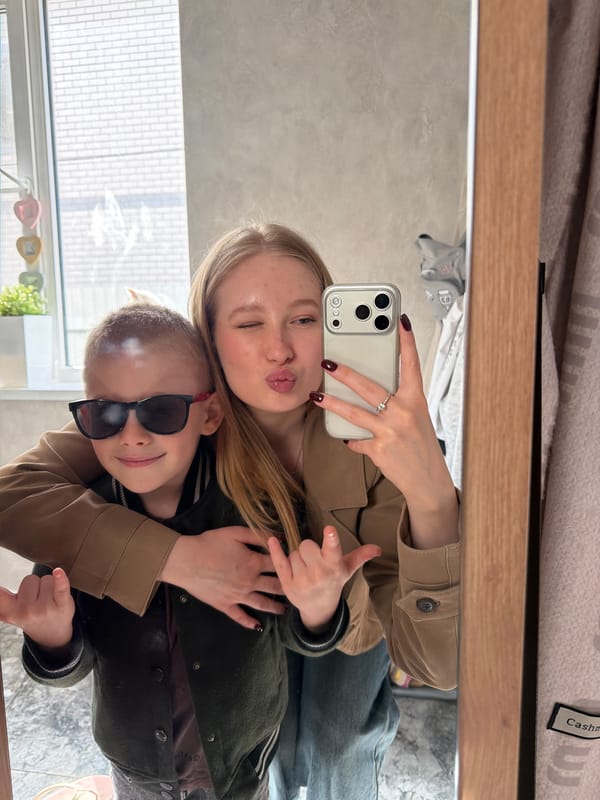 Woman takes morning selfies with pet cat in Russia