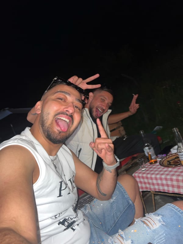 Evening outdoor social gathering documented in Bulgarian village