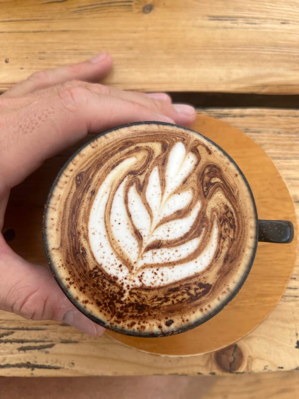 Coffee with leaf latte art enjoyed in Baturiti, Indonesia