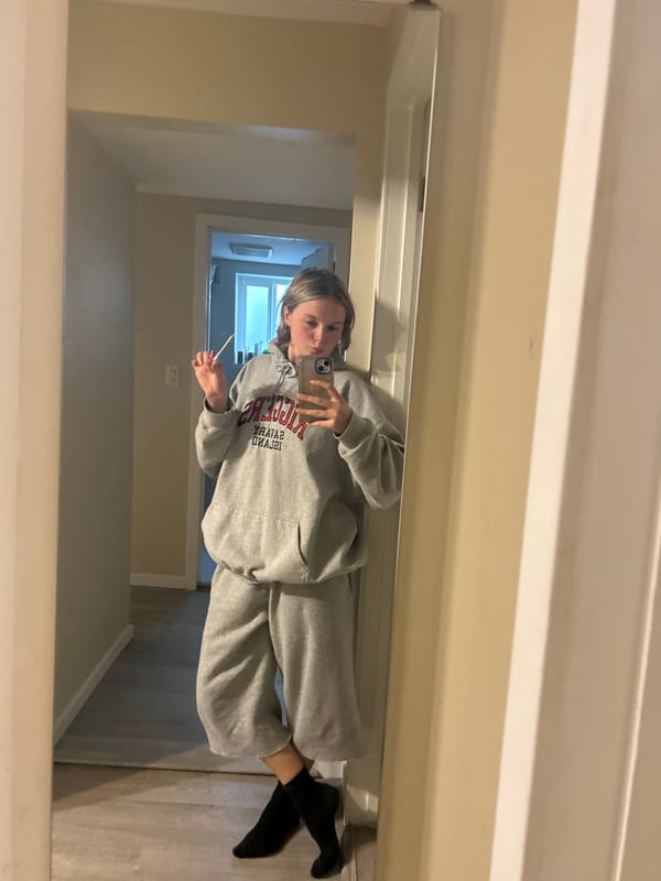 Woman takes evening selfies in Vancouver residential area