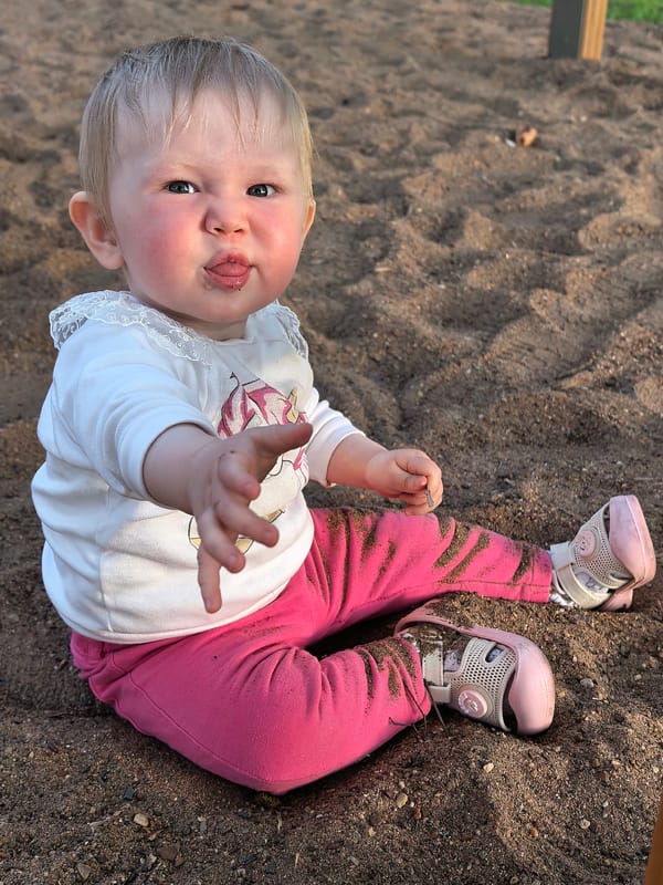 Toddler enjoys afternoon playground visit in Sterlitamak park