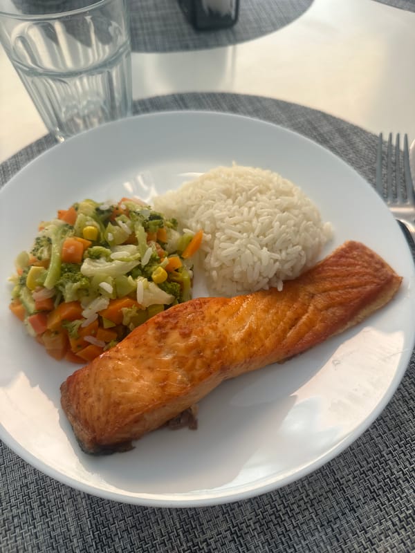 Dinner documentation: Golden salmon meal captured in Puebla