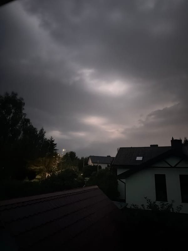 Overcast night falls over a Vilnius neighborhood