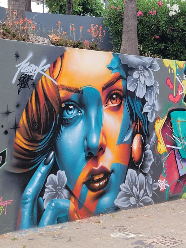 Quarteira street art, rides, and daily scenes up close