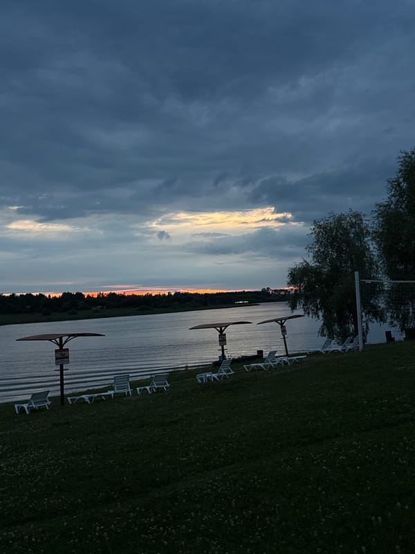 Sunset over a calm lake in Elovo, Russia