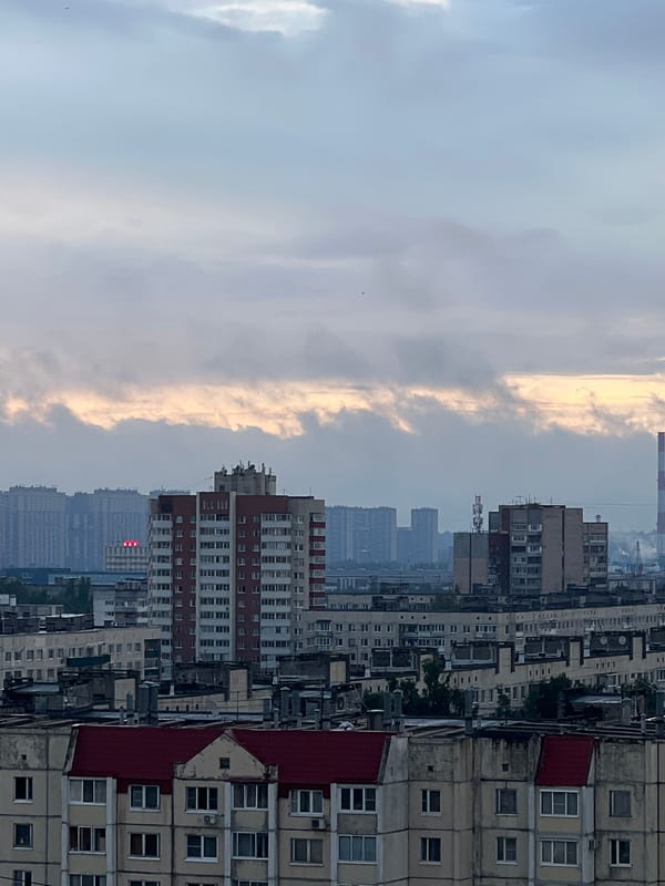 Dramatic dusk sky over a Russian apartment block skyline