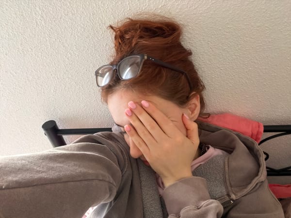 Young woman documents afternoon walk through Strasbourg with selfies