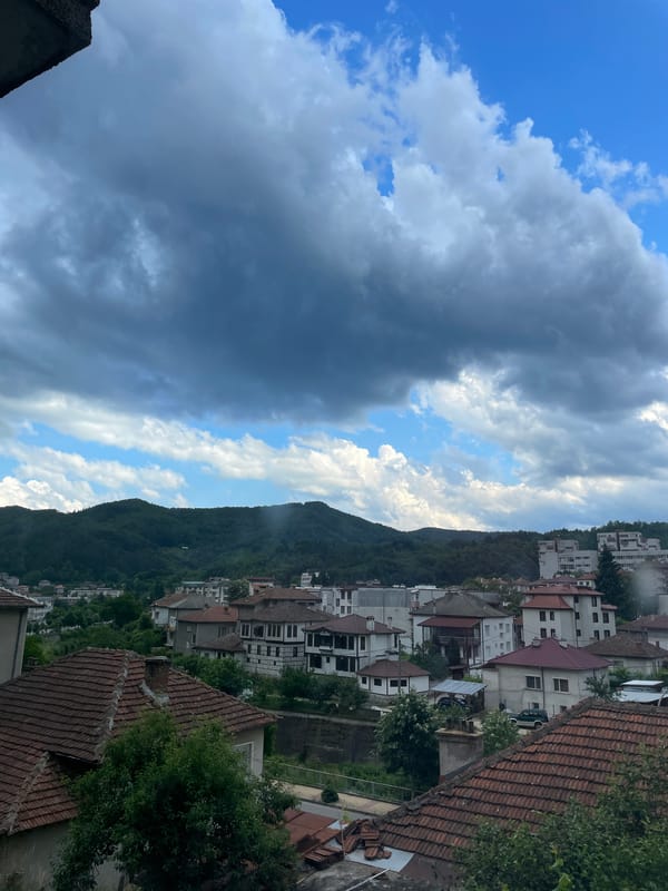 Rooftop views and cured meat in Zlatograd under stormy skies