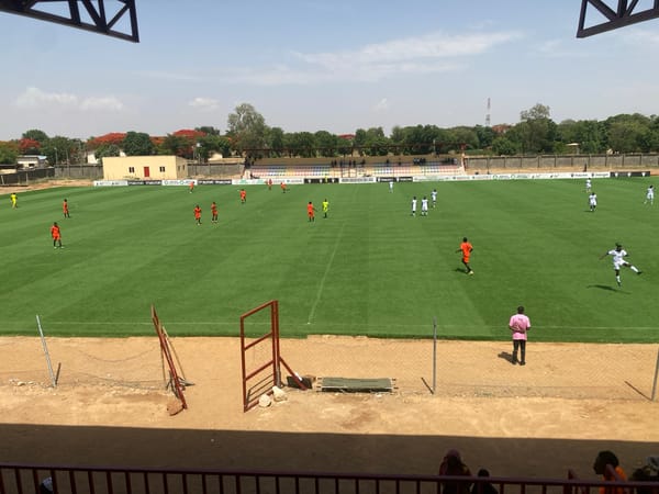 Soccer match underway at Ahmadu Bello Stadium in Nigeria