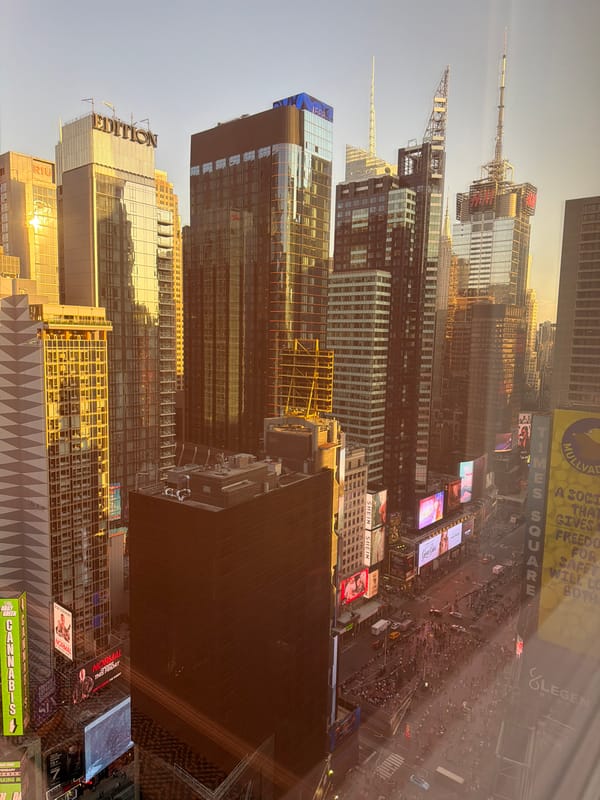 Crowds gather in Times Square on April evening