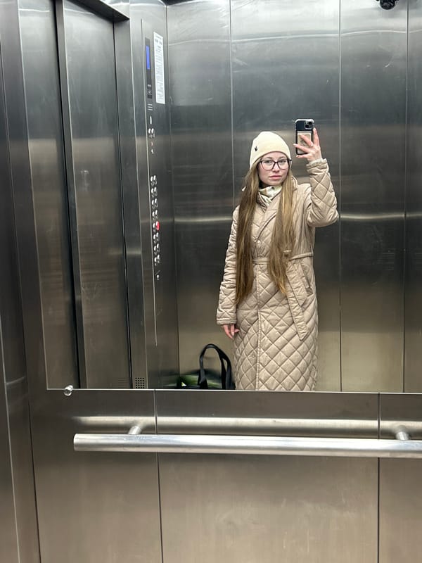 Evening elevator selfies and urban scene captured in Saint Petersburg